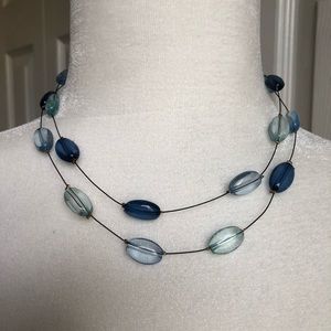 Shades of blue stones on wire necklace